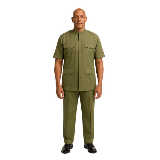A man standing against a plain background, wearing a military-inspired green leisure suit with a band collar, short sleeves, and matching pants.