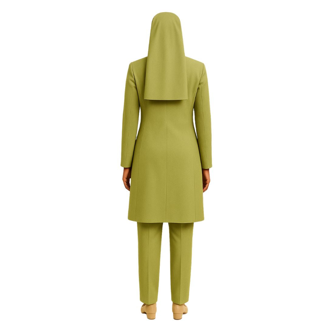 Person wearing a green outfit with a matching hijab on a white background