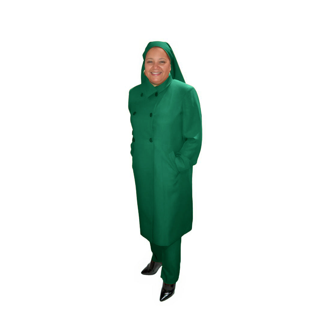 Full-body view of Leslie modeling the Leslie three-piece emerald green garment from a tilted front and side angle, designed for Muslim sisters in the Nation of Islam who value women's modest clothing.