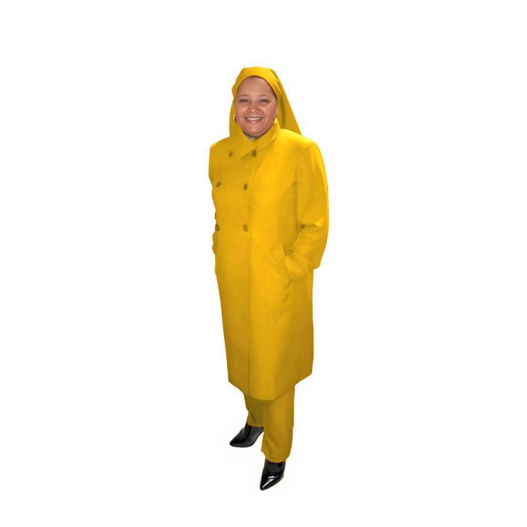Full-body view of Leslie modeling the Leslie three-piece golden glow garment from a tilted front and side angle, designed for Muslim sisters in the Nation of Islam who value women's modest clothing.