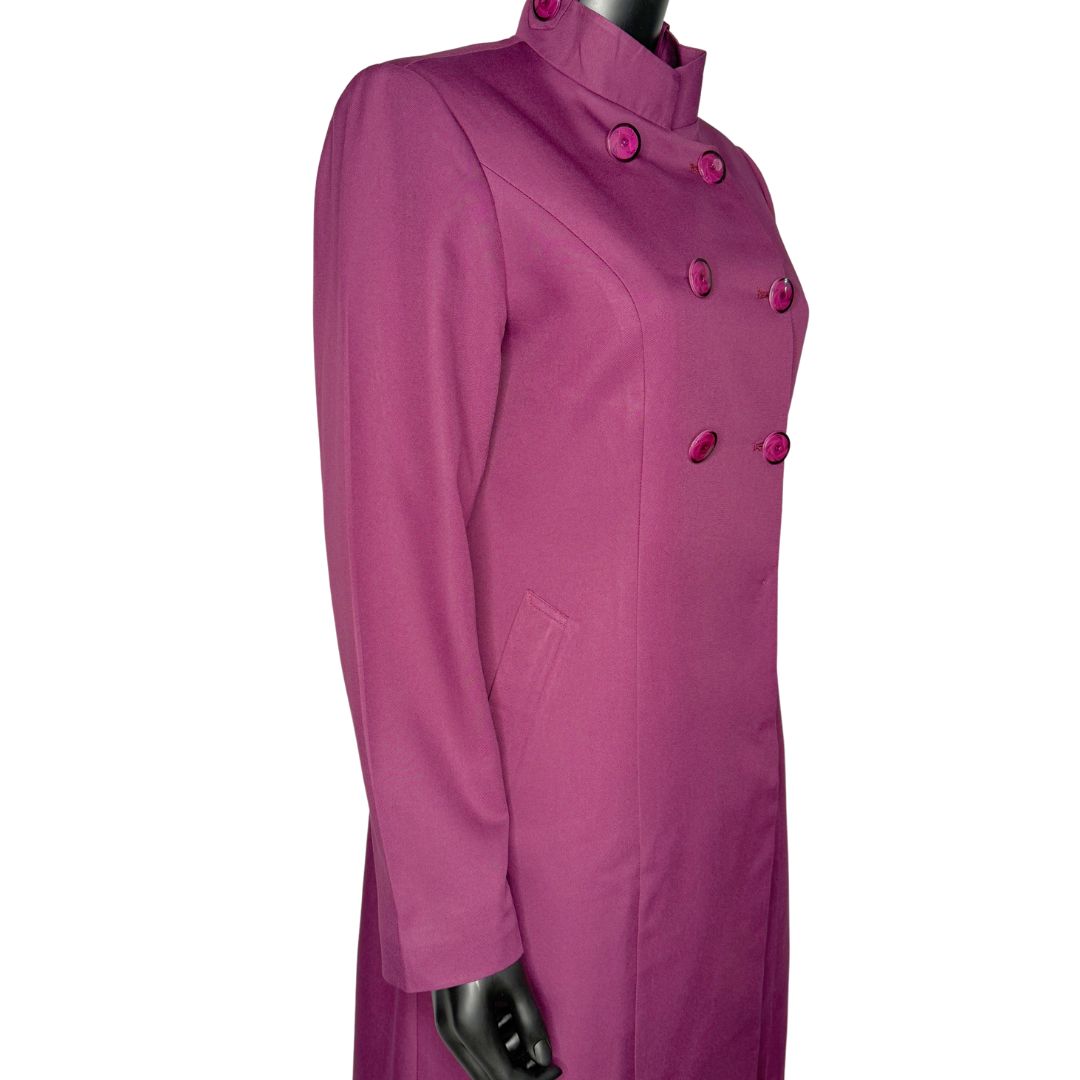 Side pocket view of the Queen three-piece fuschia garment on a mannequin, designed for Muslim sisters in the Nation of Islam who value women's modest clothing.
