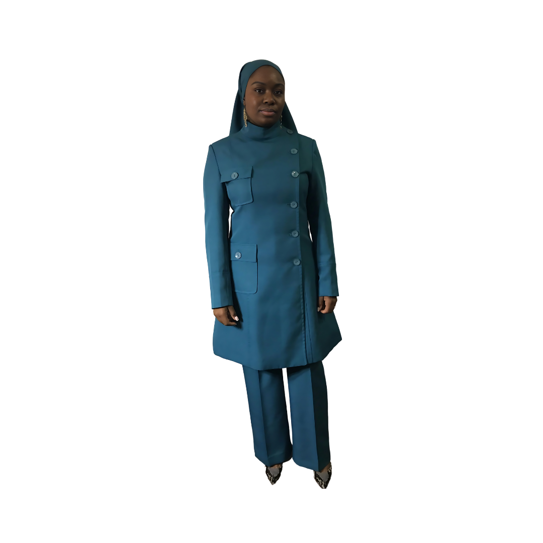 Full-body view of a sister modeling the Chandra three-piece blue garment designed for Muslim sisters in the Nation of Islam who value women's modest clothing.