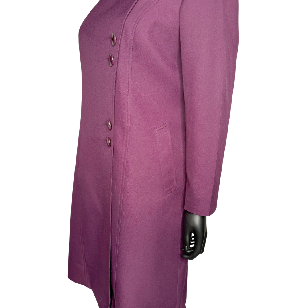 Side view of of the Aminah three-piece dark fuchsia garment on a mannequin, designed for Muslim sisters in the Nation of Islam who value women's modest clothing.