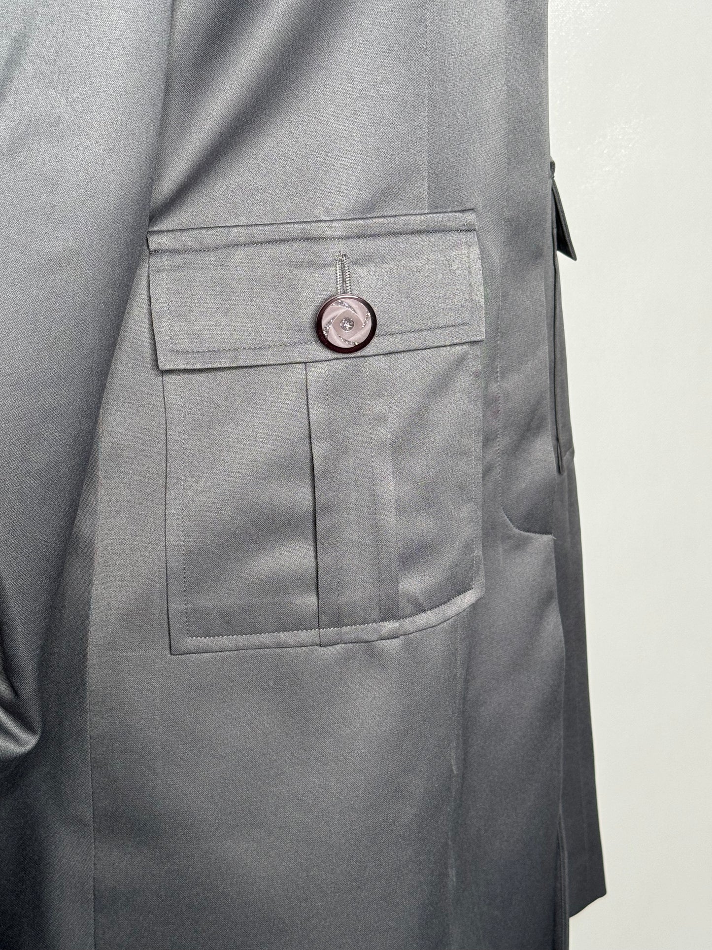 Side pocket view of the Avid 2 three-piece gray garment on a mannequin, designed for Muslim sisters in the Nation of Islam who value women's modest clothing.