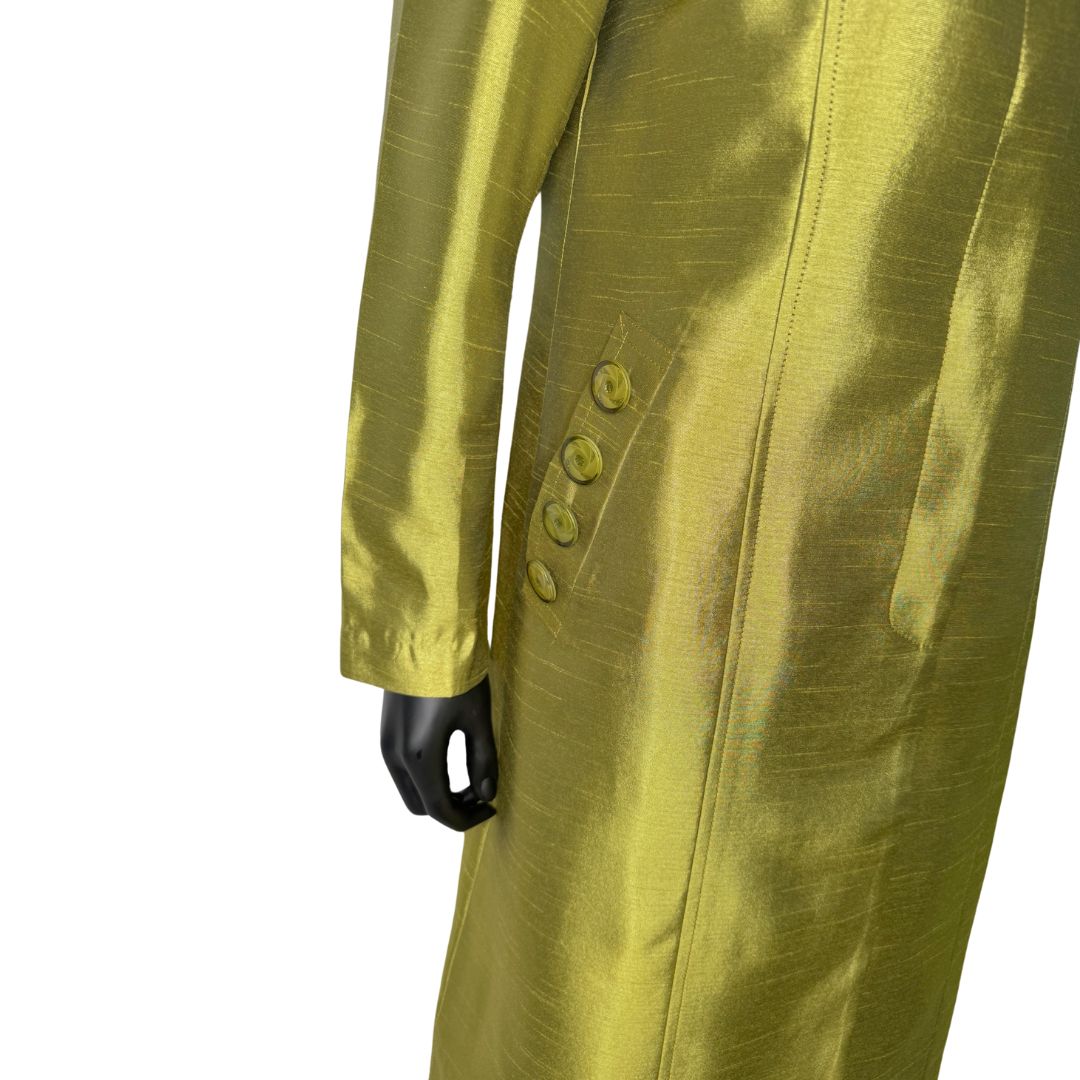 Side pocket view of the Cheryl three-piece olive garment on a mannequin, designed for Muslim sisters in the Nation of Islam who value women's modest clothing.