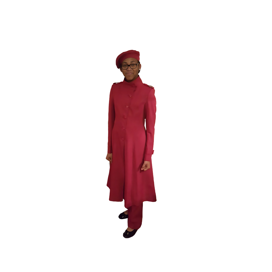 Full-body view of Kameelah modeling the Aminah three-piece red garment from a tilted front and side angle, designed for Muslim sisters in the Nation of Islam who value women's modest clothing.