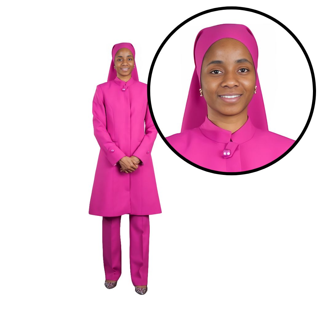 Close-up of Khadijah wearing a pink three-piece Nation of Islam women's modest clothing set from Kameelah's Closet, highlighting her matching headpiece.