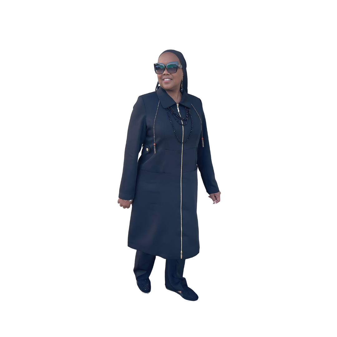 Full-body view of Maalikah modeling the Maalikah three-piece navy blue garment from a tilted front angle, designed for Muslim sisters in the Nation of Islam who value women's modest clothing. 2