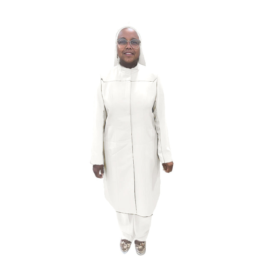 Full-body view of Maalikah modeling the Qiana three-piece brilliant white garment, designed for Muslim sisters in the Nation of Islam who value women's modest clothing.