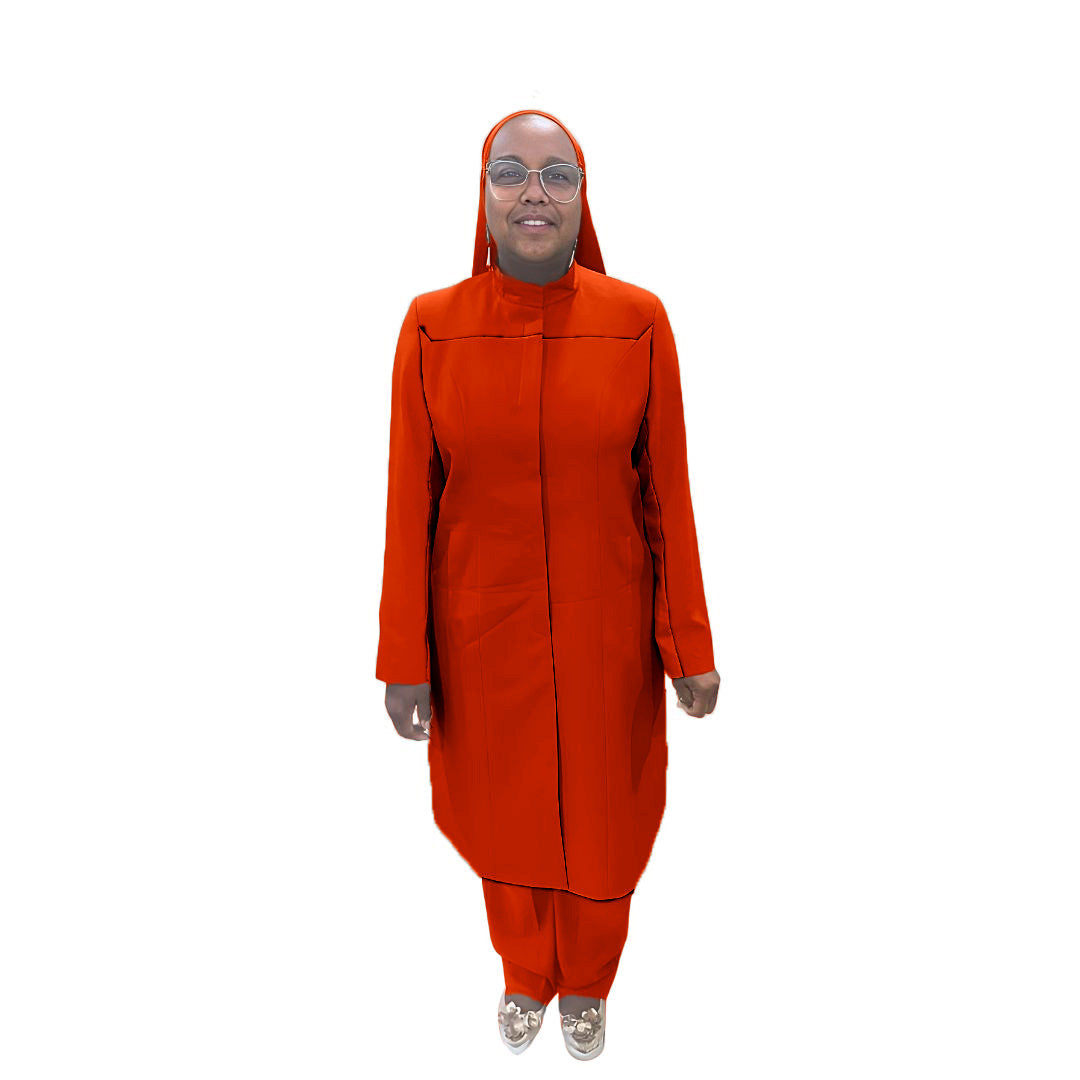 Full-body view of Maalikah modeling the Qiana three-piece fiery coral garment, designed for Muslim sisters in the Nation of Islam who value women's modest clothing.