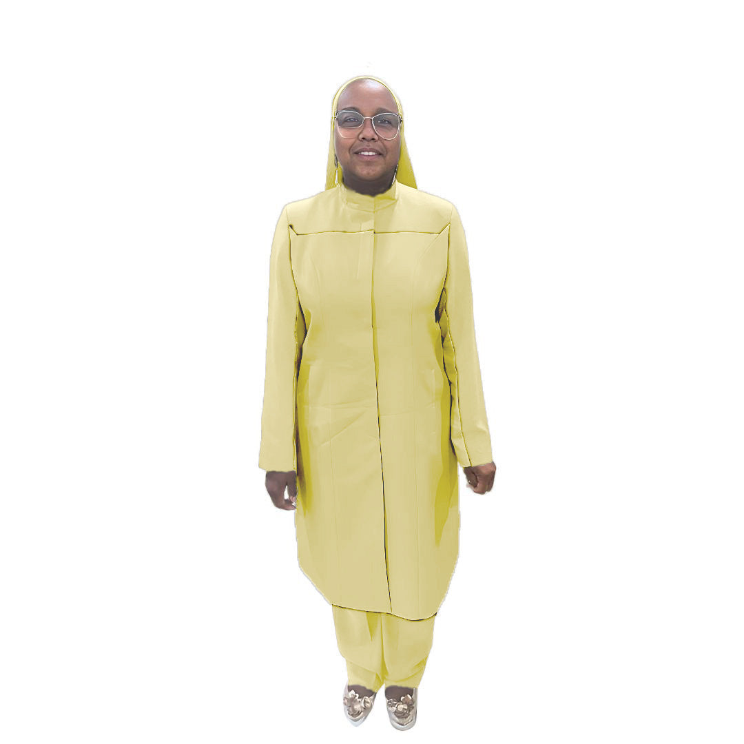 Full-body view of Maalikah modeling the Qiana three-piece golden sand garment, designed for Muslim sisters in the Nation of Islam who value women's modest clothing.