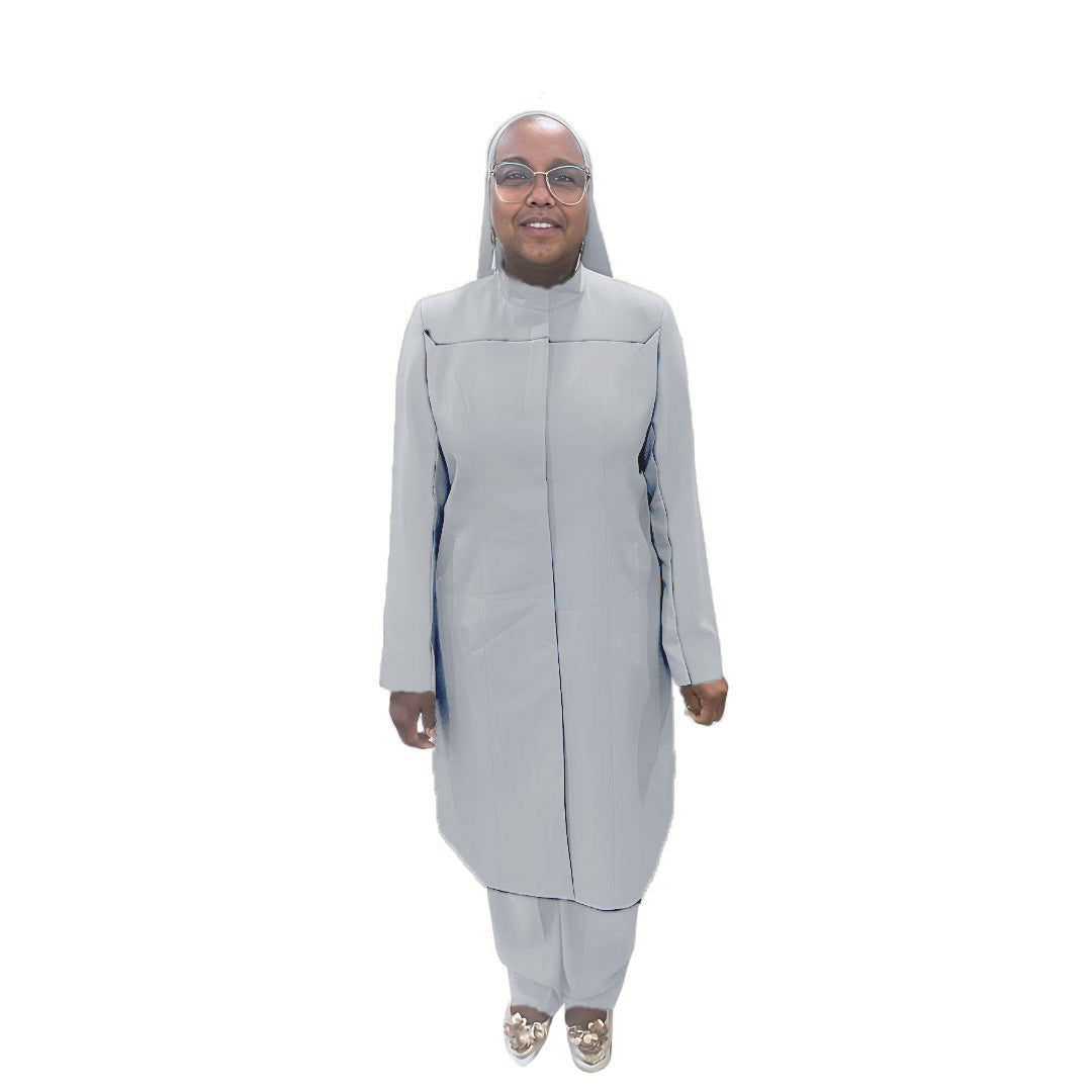 Full-body view of Maalikah modeling the Qiana three-piece northern droplet garment, designed for Muslim sisters in the Nation of Islam who value women's modest clothing.