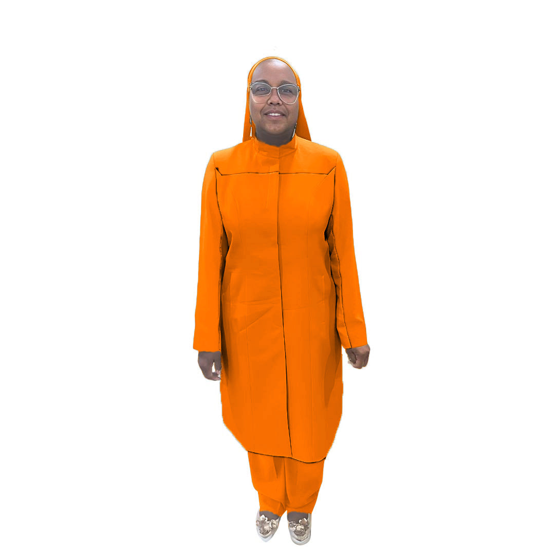 Full-body view of Maalikah modeling the Qiana three-piece pumpkin spice garment, designed for Muslim sisters in the Nation of Islam who value women's modest clothing.