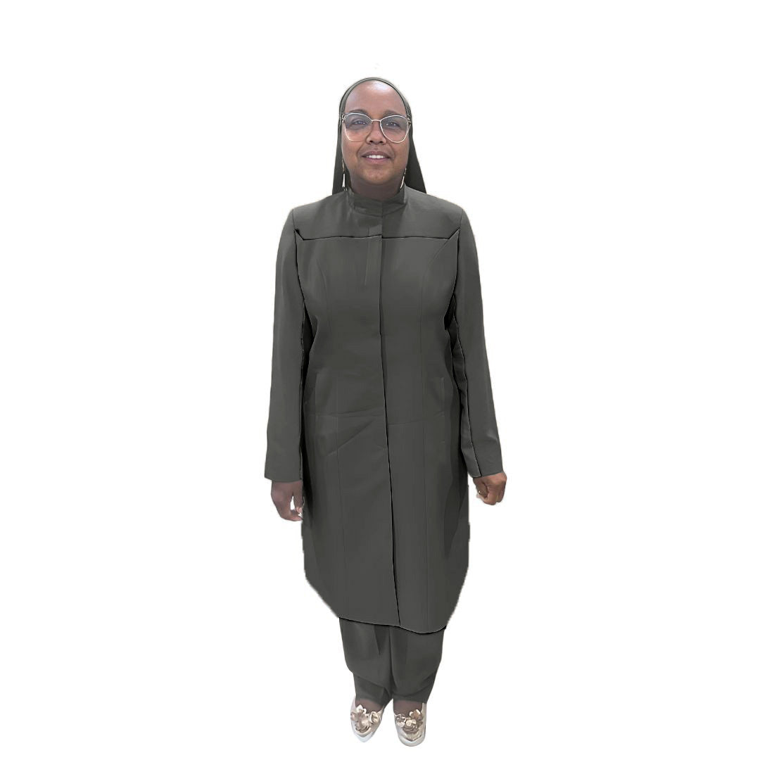 Full-body view of Maalikah modeling the Qiana three-piece quiet shade garment, designed for Muslim sisters in the Nation of Islam who value women's modest clothing.