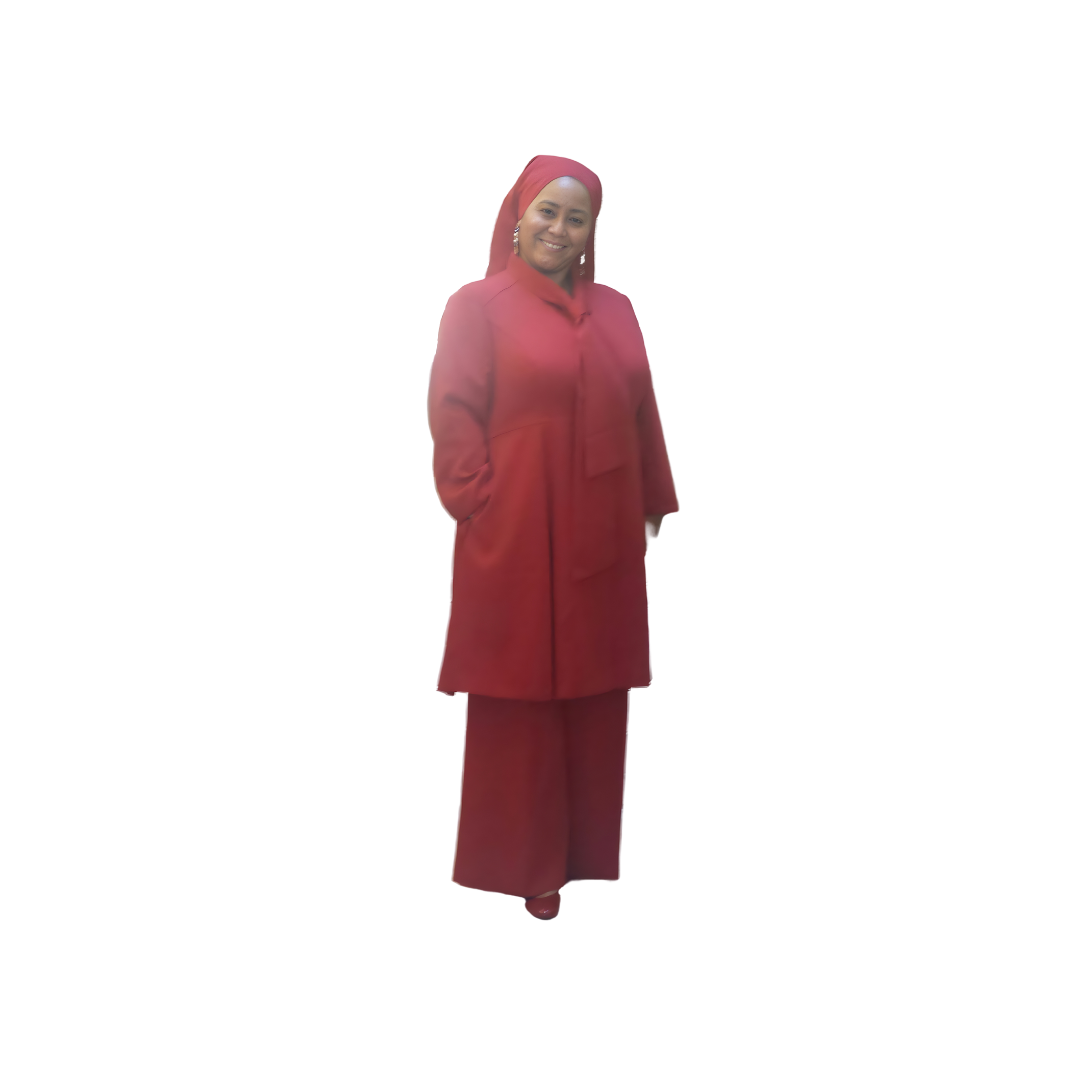 Full-body view of a woman modeling the Sadiyah Bow three-piece red garment from a tilted front and side angle, designed for Muslim sisters in the Nation of Islam who value women's modest clothing.